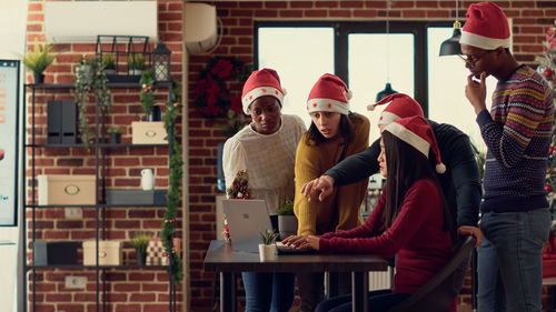 Group of people working in store