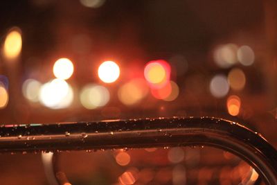 Defocused image of illuminated lights at night