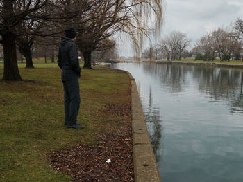 Rear view of a man in water