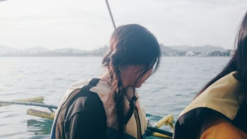 Cropped image of boat in lake