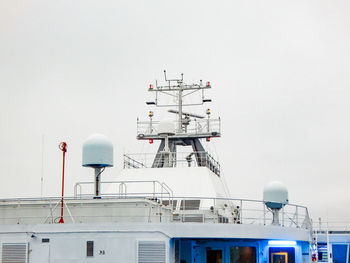 View of communications tower against clear sky