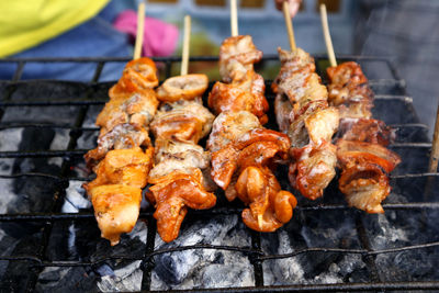 Close-up of meat on barbecue grill