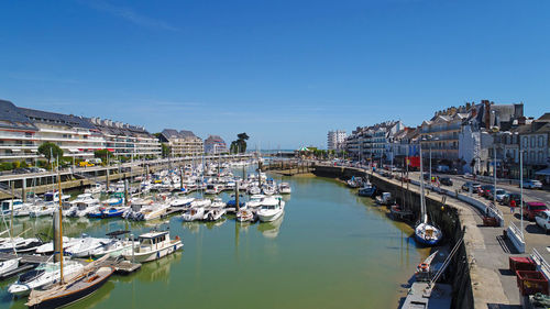 High angle view of harbor against clear sky