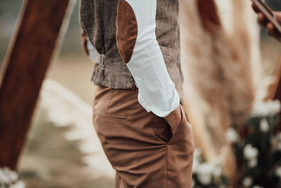 Rear view of man walking outdoors