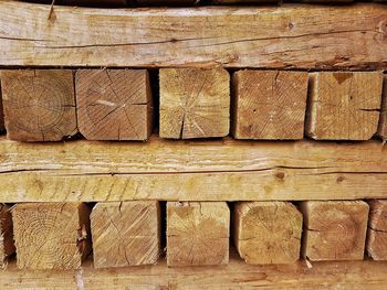 Full frame shot of stack of wood