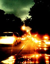 Cars on road at night