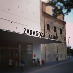 Information sign in front of building