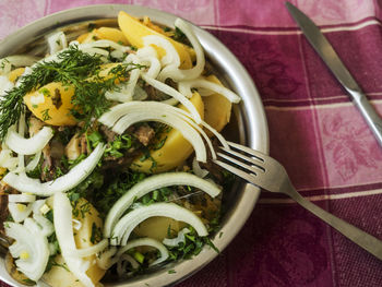 Close-up of food in bowl on tablecloth