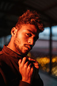 Portrait of young man looking away