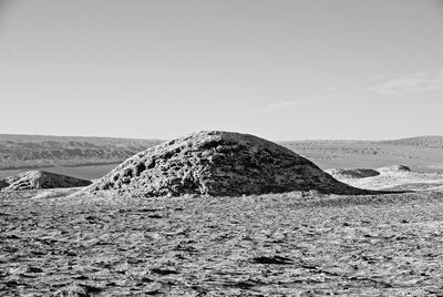Scenic view of desert against clear sky