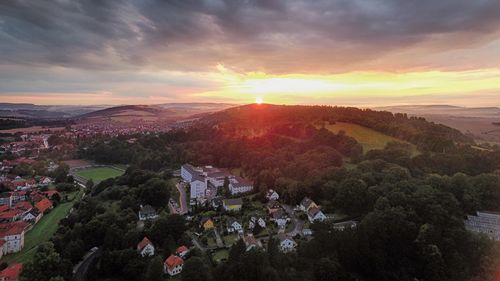 High angle view of city during sunset