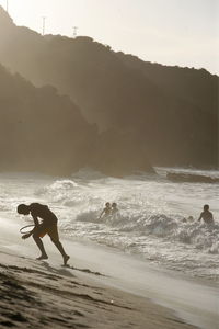 Tourists enjoying on beach