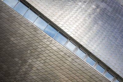 Low angle view of modern building against sky