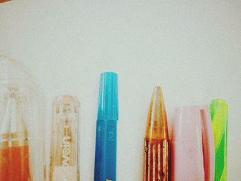 High angle view of multi colored pencils on white table