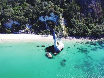 Aerial view of sea during sunny day