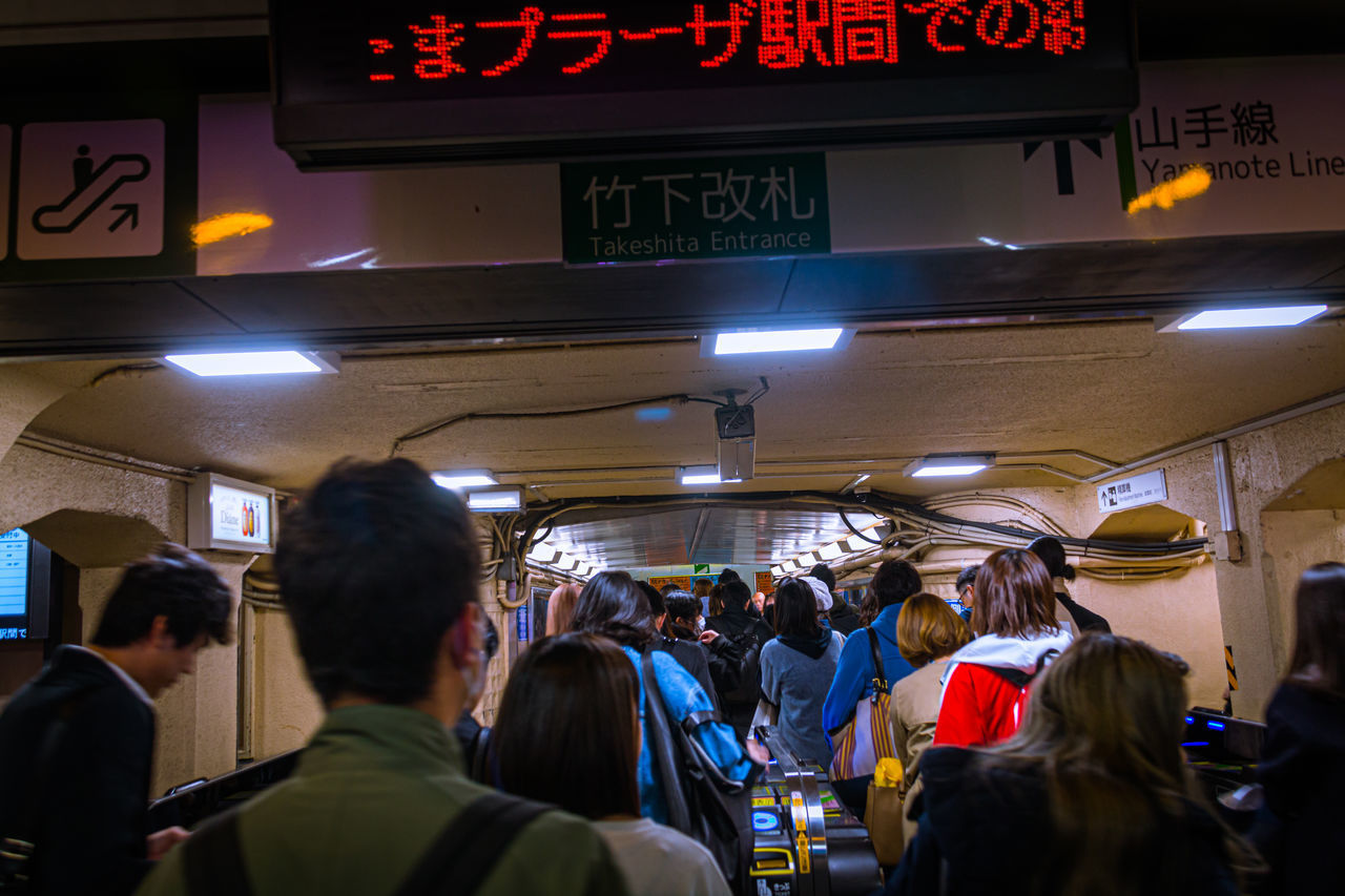 GROUP OF PEOPLE IN THE DARK