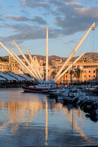 View of harbor against cloudy sky