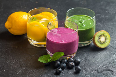Fruits in glass on table