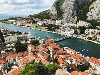 High angle view of townscape by river