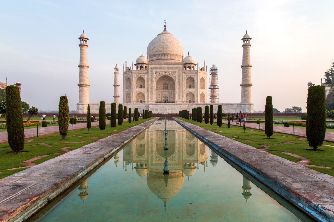 architecture, built structure, water, famous place, history, reflection, travel destinations, tourism, dome, sky, architectural column, arch, grass, the past, day, outdoors, capital cities, monument, ancient, canal, standing water