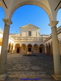 Facade of historic building against clear blue sky