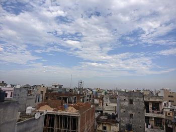 High angle view of buildings against sky