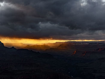 Scenic view of dramatic sky during sunset