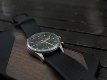 High angle view of clock on table