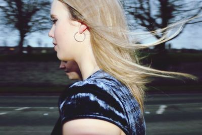 Side view of a young woman