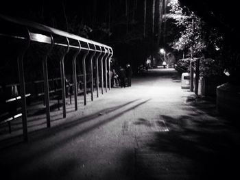 Illuminated road at night