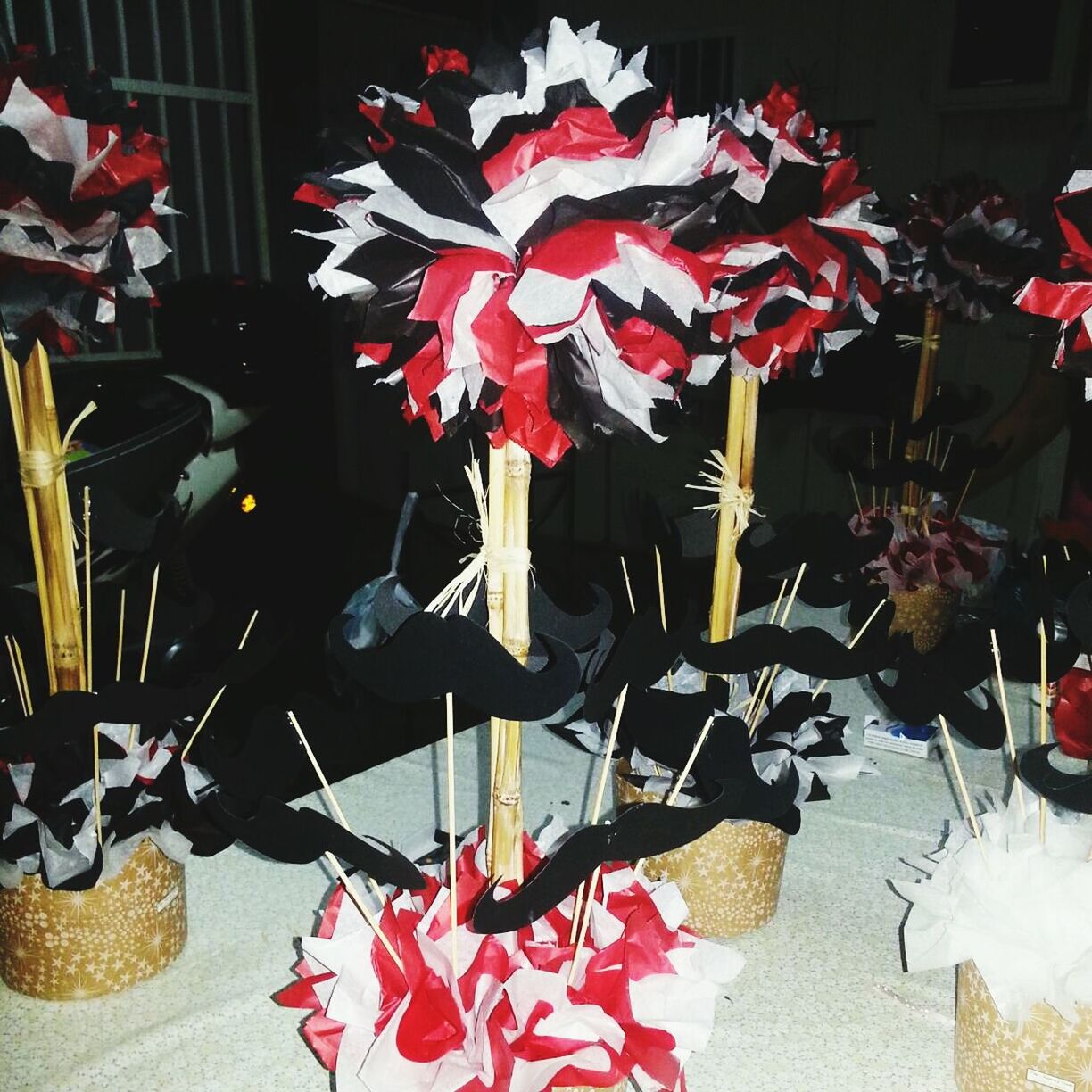 red, indoors, flower, variation, decoration, high angle view, abundance, arrangement, large group of objects, petal, hanging, chair, choice, table, still life, multi colored, no people, celebration, freshness, bouquet