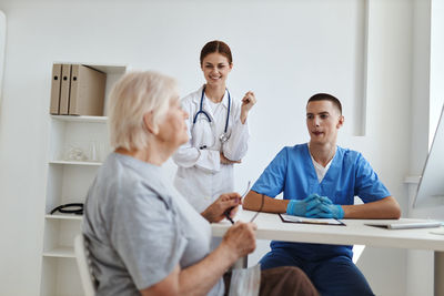 Doctor consulting patient at hospital