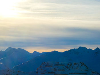 Afternoon sun in snowcapped austrian mountains