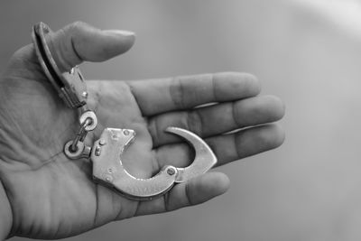 Close-up of person holding hands