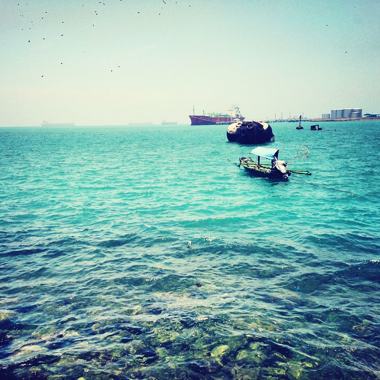 water, sea, nautical vessel, transportation, horizon over water, mode of transport, waterfront, boat, rippled, blue, scenics, tranquil scene, tranquility, beauty in nature, clear sky, nature, seascape, sky, travel, sailing