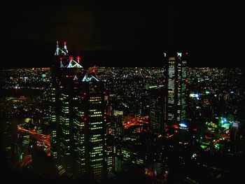 Illuminated cityscape at night