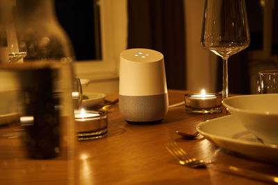 Close-up of tea light candles on table