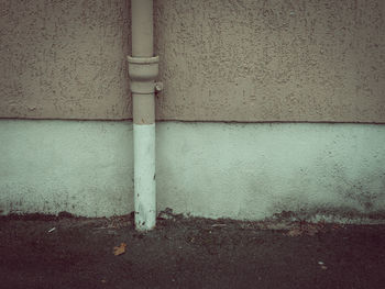 Close-up of pipe on wall