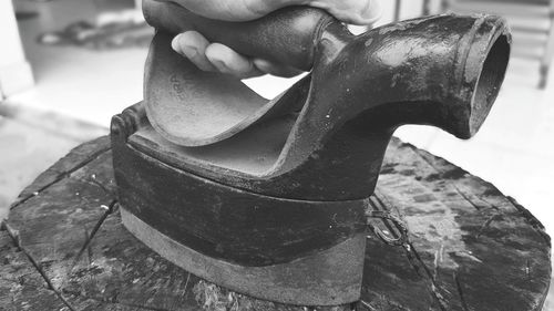 Close-up of man working on wood