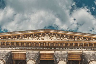 Low angle view of building against blue sky