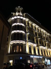 Low angle view of illuminated building at night