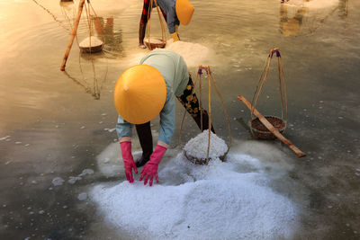 Man working at salt flat