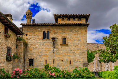 Low angle view of old building against sky