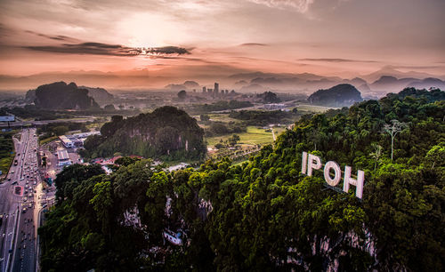 Panoramic view of trees and mountains against sky