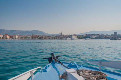 Scenic view of bay against clear sky