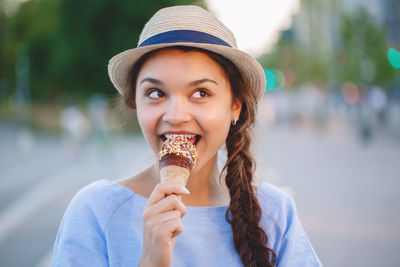 Close-up of woman eating ice cream