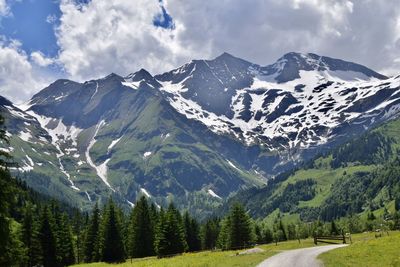 Scenic view of snowcapped mountains against sky