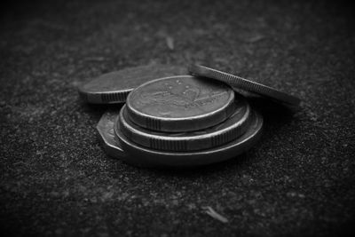 Close-up of coin on table