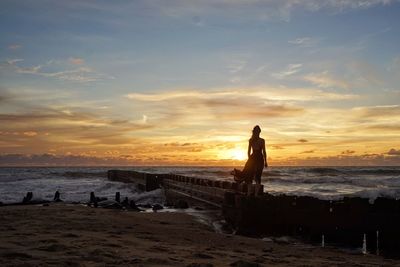 Scenic view of sea at sunset