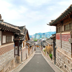 Korean style house village against the blue sky